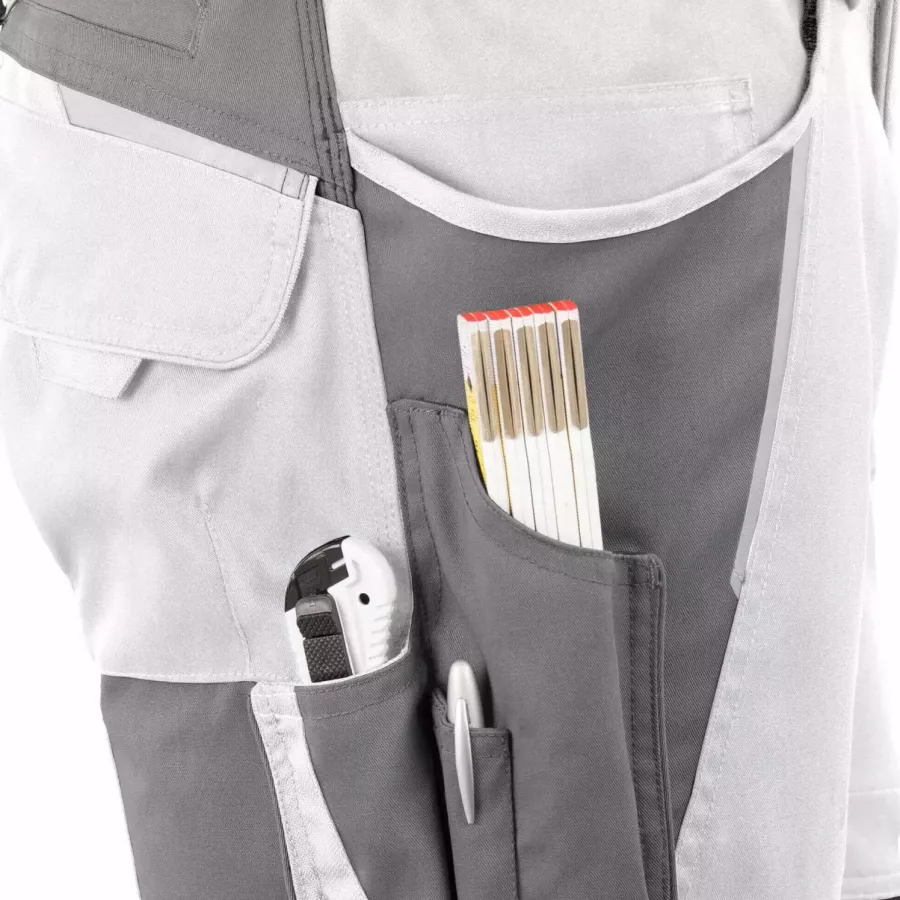 **Multiple Tool Pockets** keep your essentials close at hand so you can work efficiently without breaking focus.