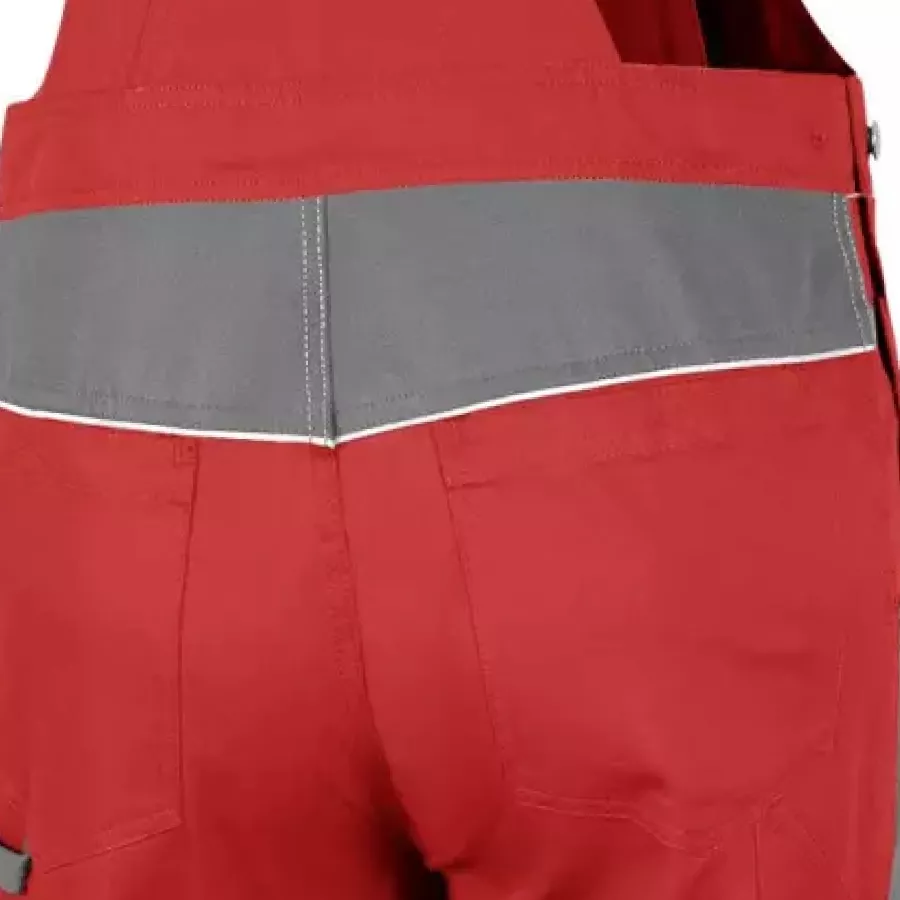 **Elastischer Stretcheinsatz** verbessert die Bewegungsfreiheit, damit Sie sich ohne Einschränkung bücken, strecken und arbeiten können.