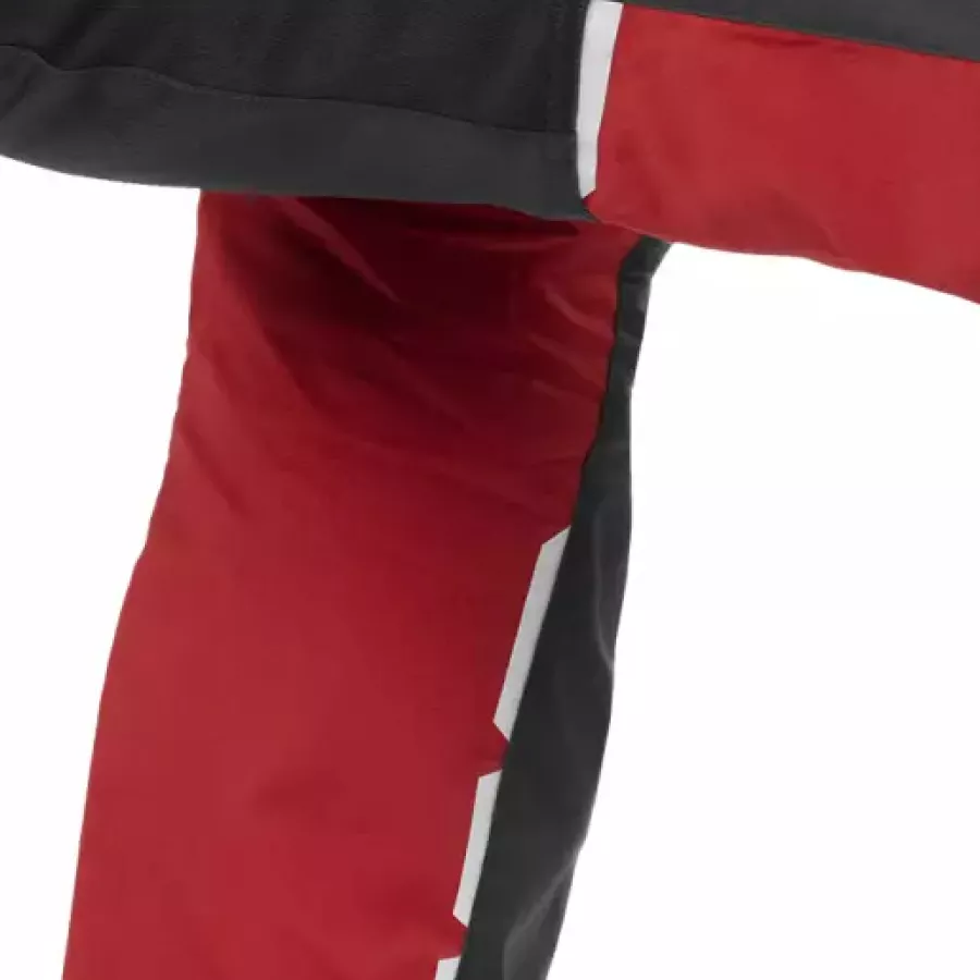 **Reflektierende Details** erhöhen die Sichtbarkeit, damit Sie bei schlechten Lichtverhältnissen gesehen werden und sicher bleiben.