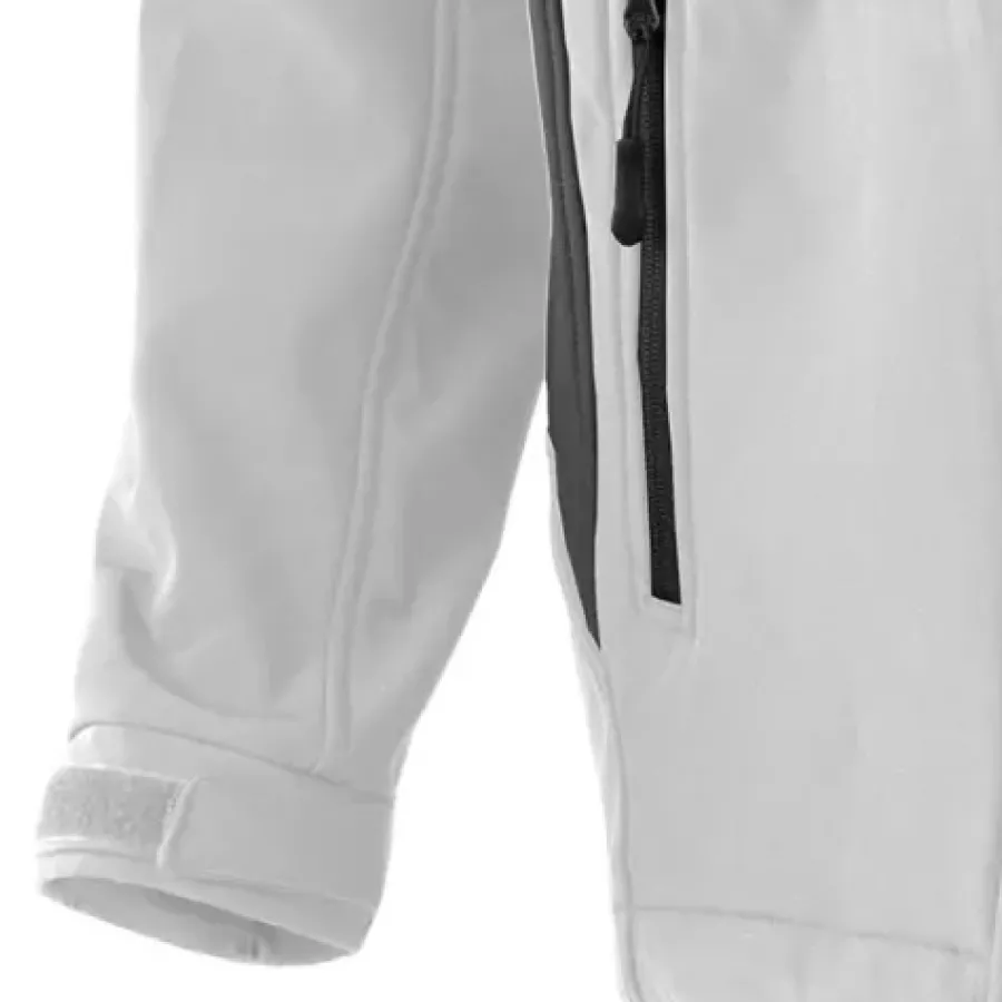 **Klettverschluss-Bündchen** ermöglichen eine individuelle Anpassung an den Handgelenken, damit die Wärme drinnen bleibt und die Bewegungsfreiheit uneingeschränkt ist.