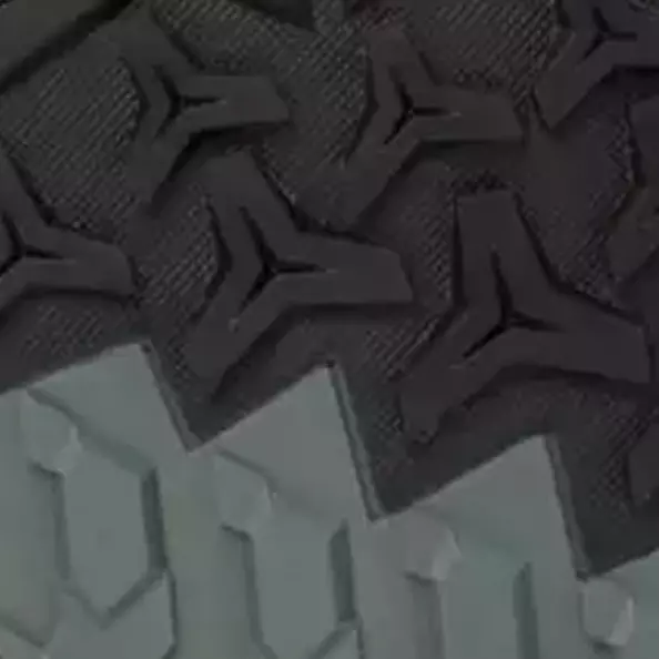 **AT TREAD outsole** provides maximum SRC-rated grip on slick floors and uneven terrain. Its durable tread pattern ensures stability indoors and outdoors, giving you *confidence* and **reliable traction** in every work environment.