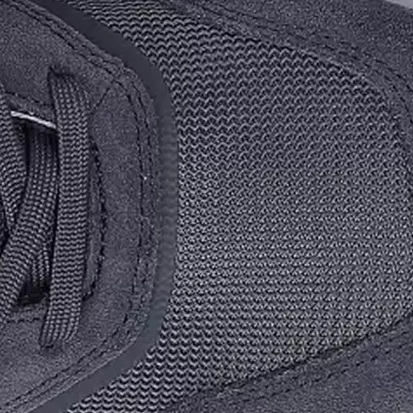 Constructed from a **lightweight and flexible leather** with **mesh-upper** that ensures *breathability* and durability, making it perfect for extended wear. The design supports natural foot movement and provides protection without sacrificing comfort.