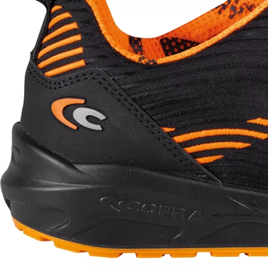 **Non-Metallic Anti-Perforation Midsole** protects against sharp objects while remaining lightweight and metal-free.