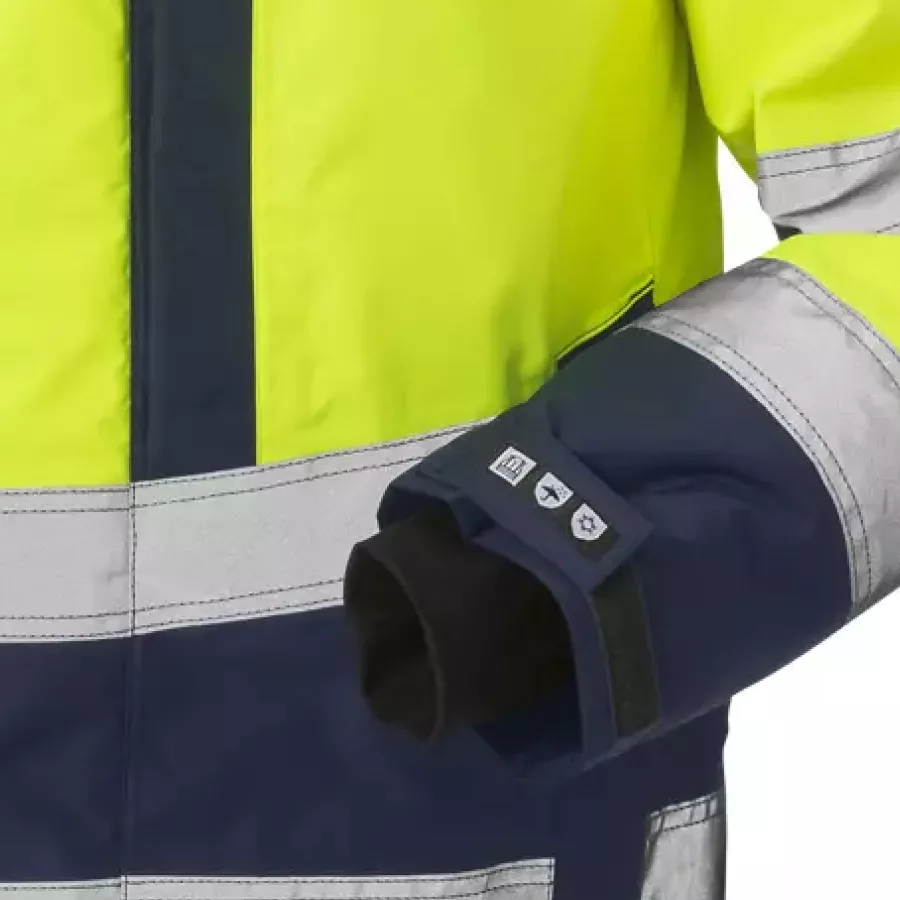 **Hook and Loop Adjustable Sleeves with Thumb Grip** ensure a secure, comfortable fit that stays in place during active work.
