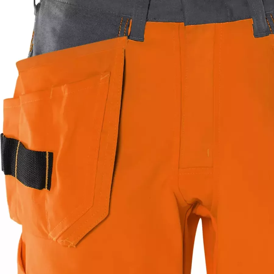 **CORDURA® Reinforced Tool Pockets** keep your tools secure and resilient against daily wear.