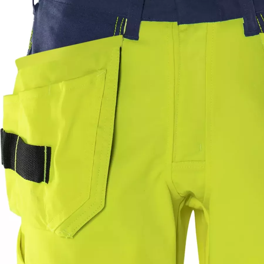 **CORDURA® Reinforced Tool Pockets** keep your tools secure and resilient against daily wear.