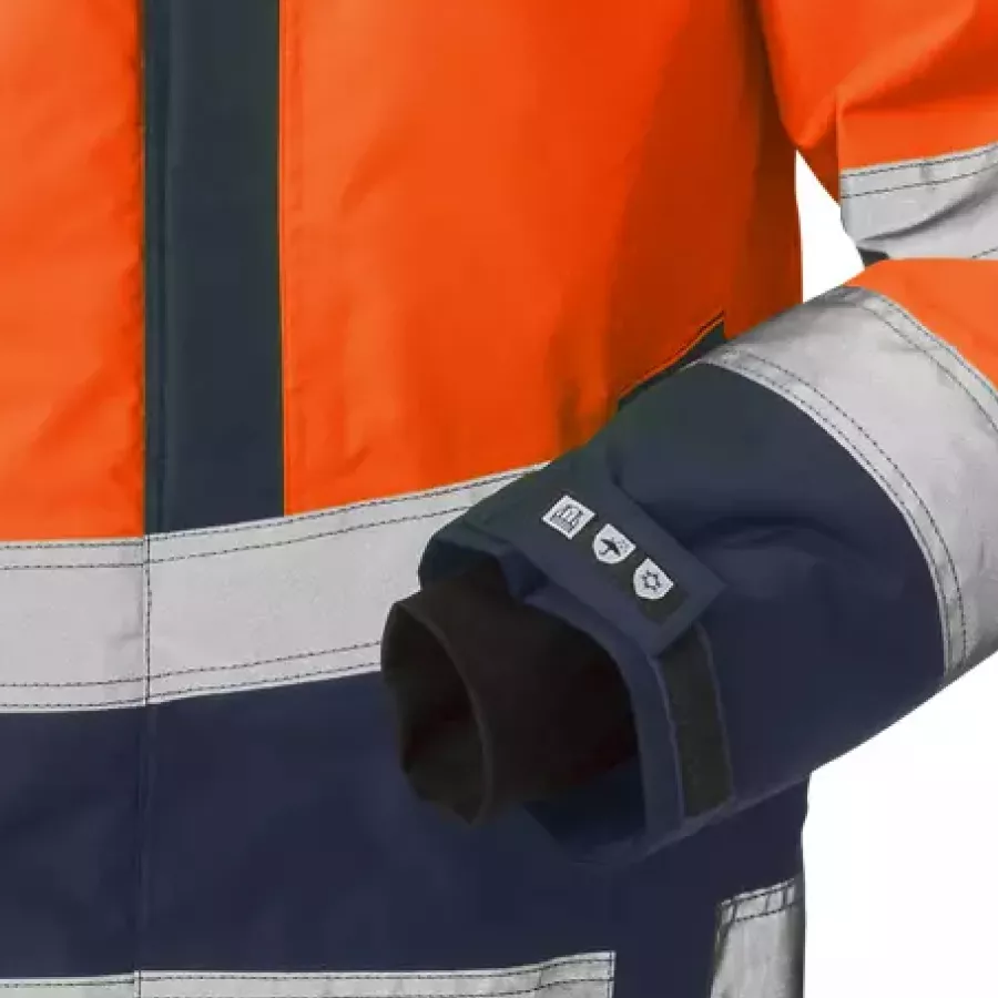 **Per Klettverschluss verstellbare Ärmel mit Daumenloch** sorgen für einen sicheren, bequemen Sitz, der bei aktiver Arbeit nicht verrutscht.