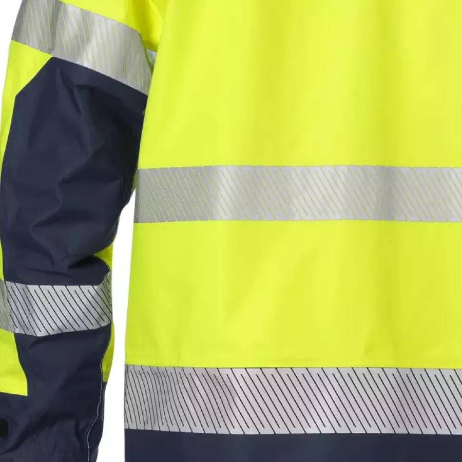 Die abnehmbare Kapuze ermöglicht eine einfache Anpassung an wechselnde Wetter- und Arbeitsbedingungen.