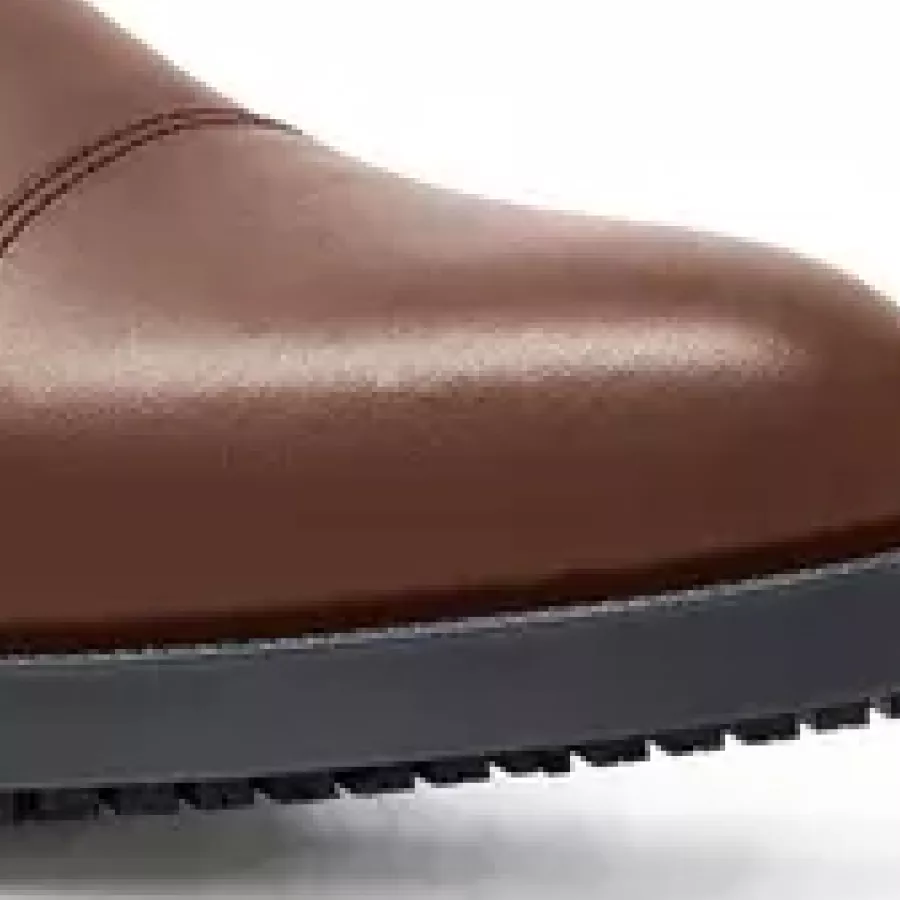 **Water-Resistant Upper** keeps your feet dry and polished-looking through long days and unexpected spills.