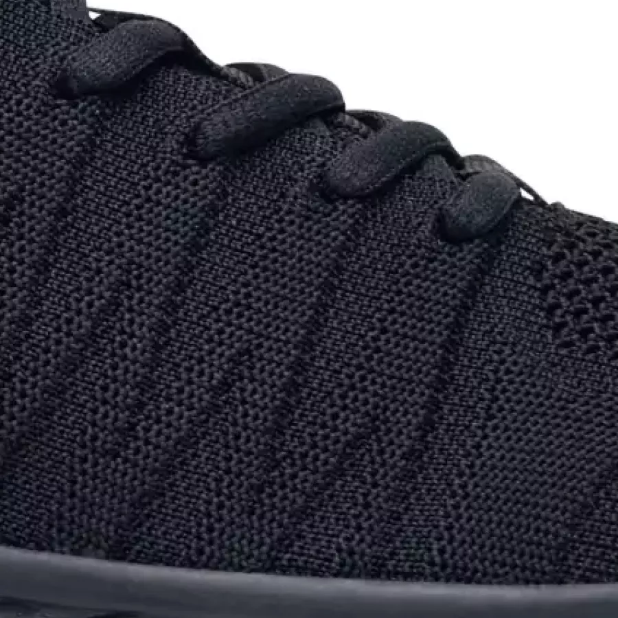 **Recycled Polyester Lining** surrounds your feet with a smooth, comfortable feel while supporting a more thoughtful choice of materials.