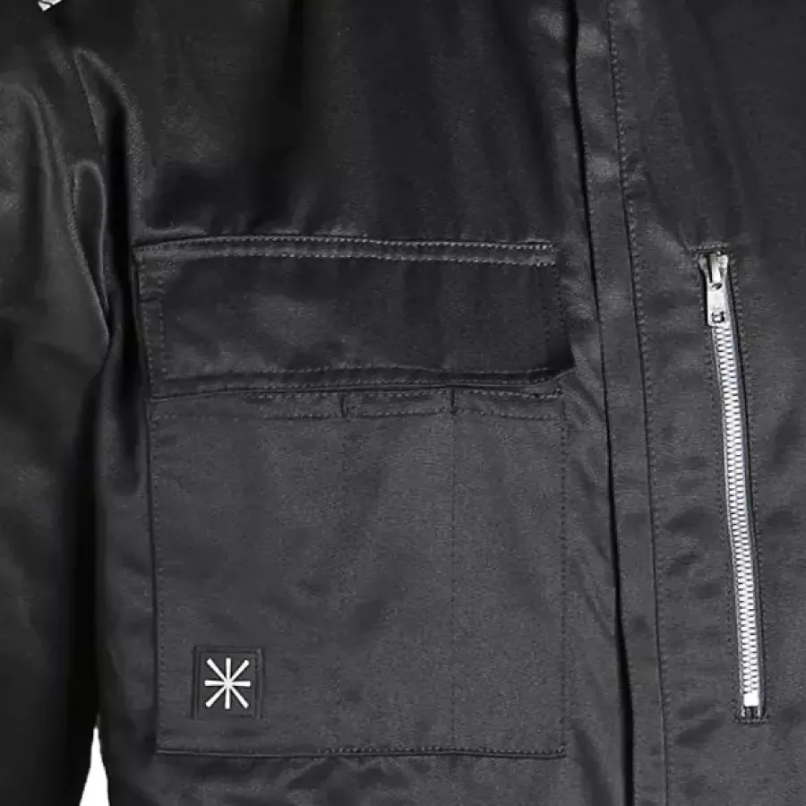 **Multiple Pockets** offer convenient storage for tools and essentials within easy reach.