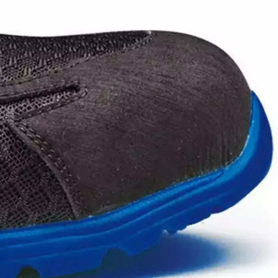 Die **Komposit-Zehenschutzkappe** schützt Ihre Füße vor Stößen und hält den Schuh leicht für ganztägigen Komfort.