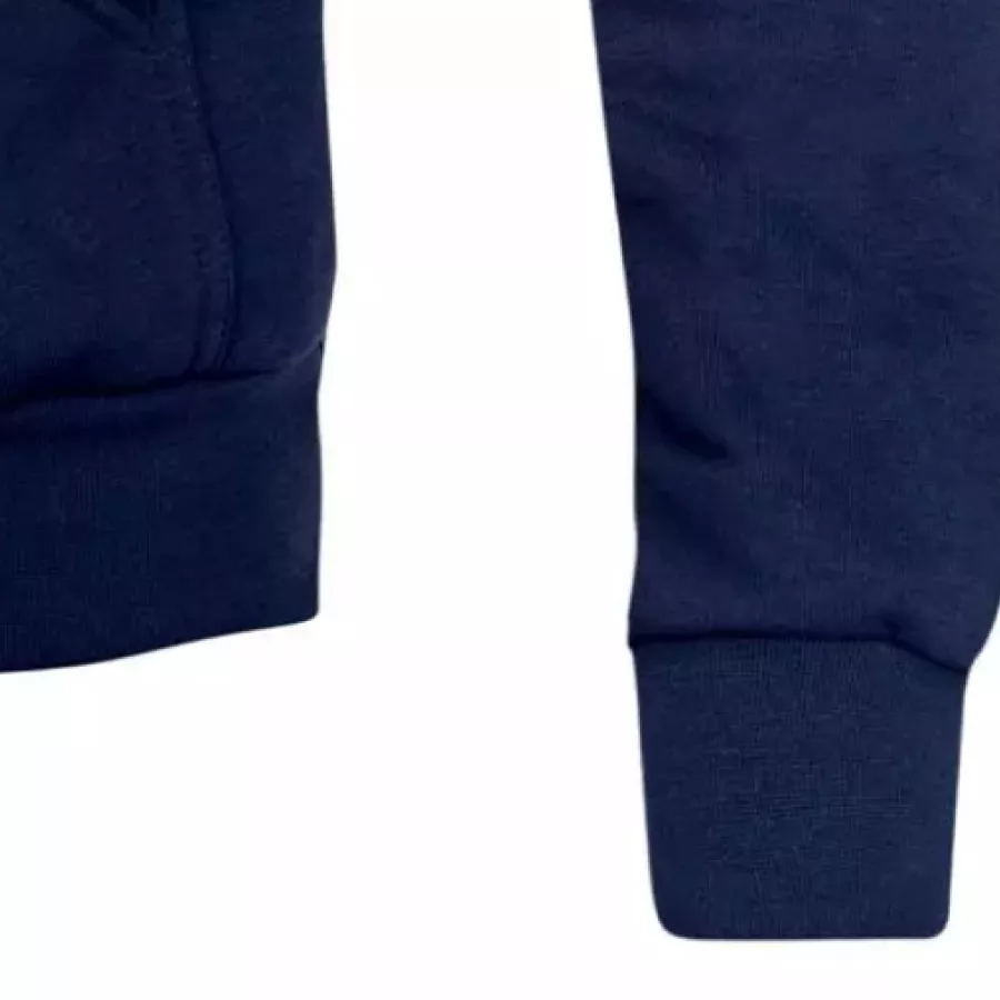 **Ribbed Knit Cuffs** keep the sleeves comfortably in place for a snug feel that stays sharp all day.