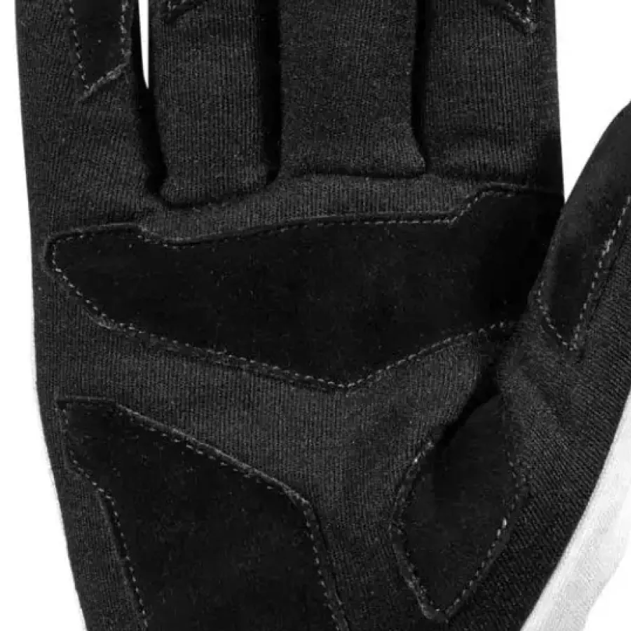 **Suede Palm Construction** enhances grip and tactile control so every steering input feels precise and confident.