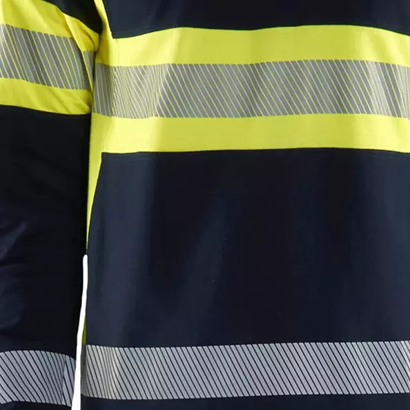 Stay visible and safe with **flame-retardant transfer reflective strips** strategically placed on the shirt. The segmented design allows for maximum flexibility and breathability while providing optimal visibility in low-light conditions, ensuring you can be seen by others.