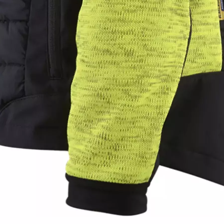 **Elastische Bündchen** lassen keine kalte Luft eindringen und halten die Ärmel bequem an Ort und Stelle.