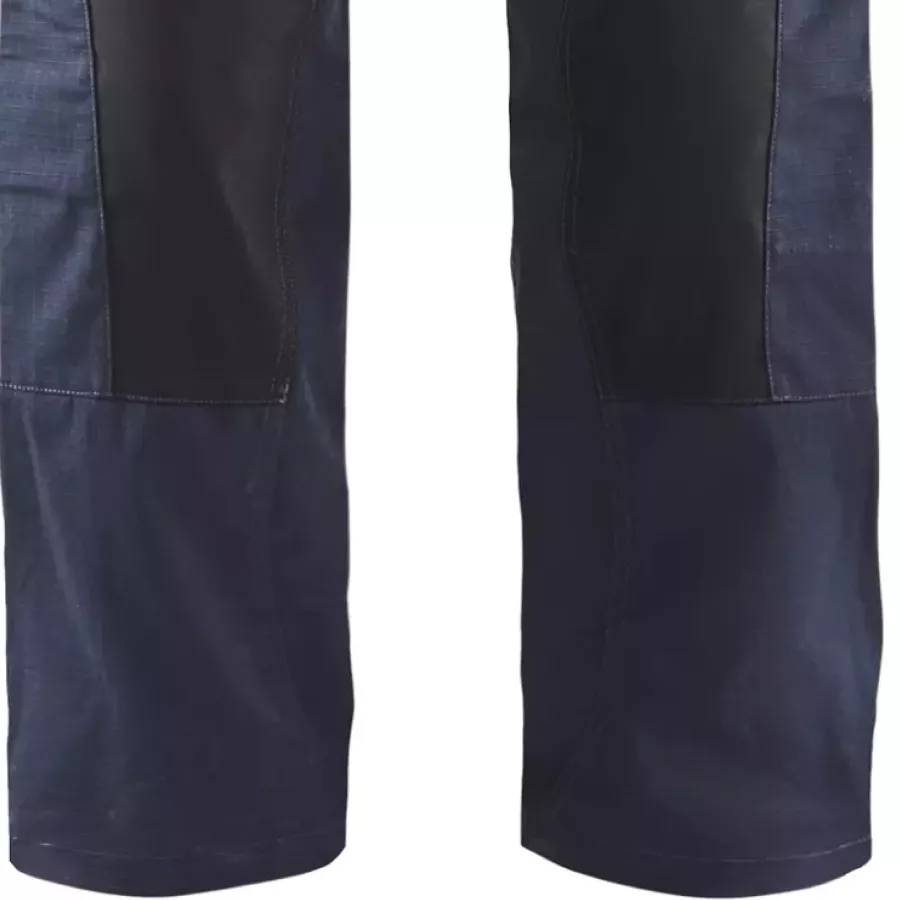 **Stretch Inserts at Calves** deliver unrestricted motion and lasting comfort through any task.