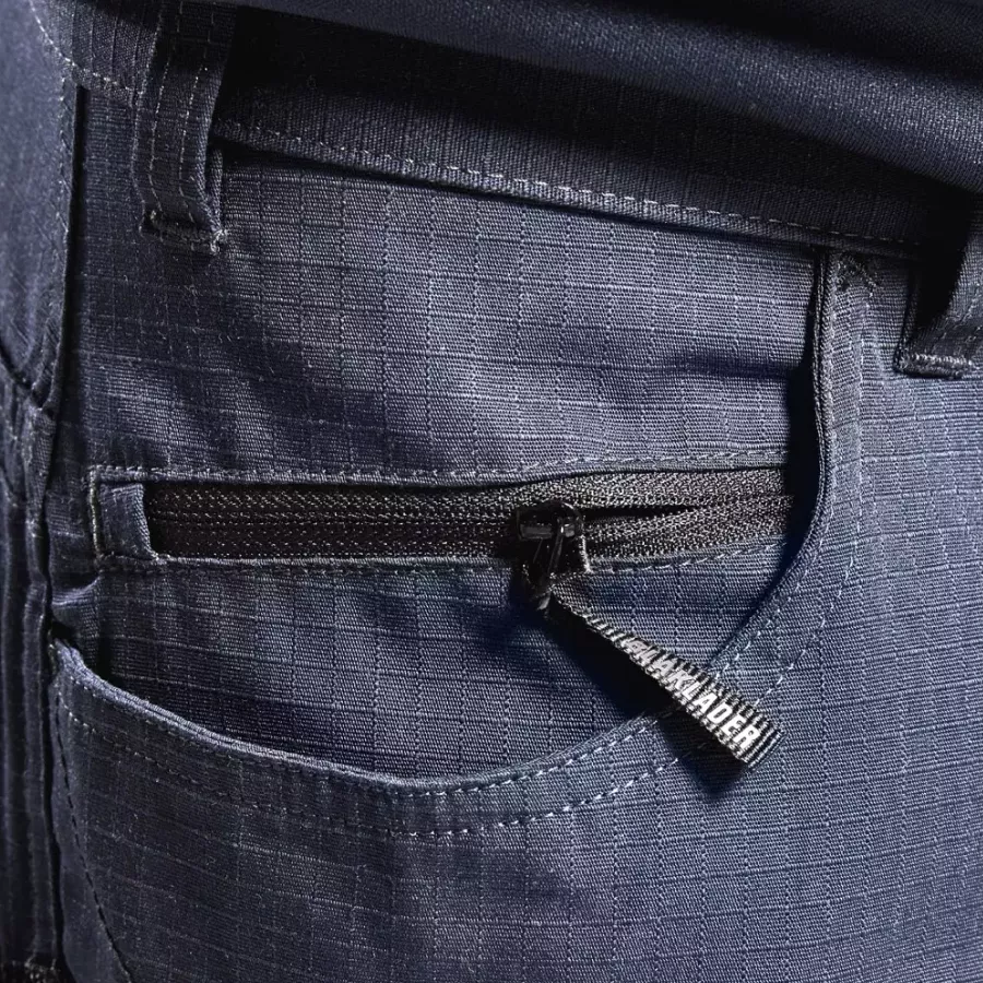 **Zipper Pocket** keeps your essentials secure and easy to reach while you work.