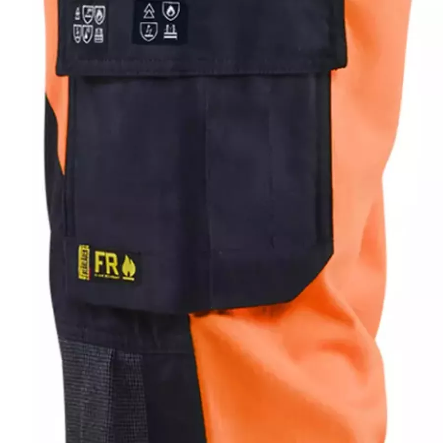 **Flammhemmendes Gewebe** schützt Sie vor Hitze und Funken, damit Sie in risikoreichen Arbeitsumgebungen mit Vertrauen arbeiten können