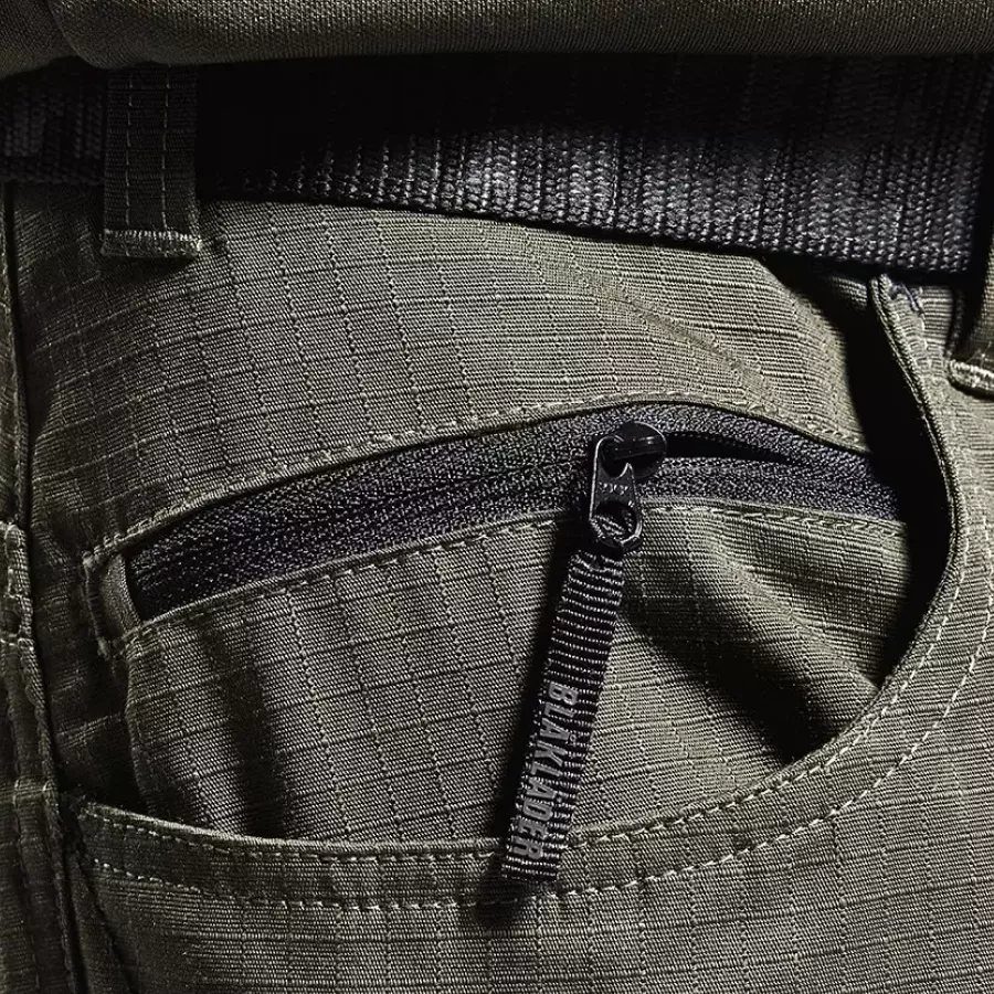 **Zipper Pocket** keeps your essentials secure and easy to reach while you work.
