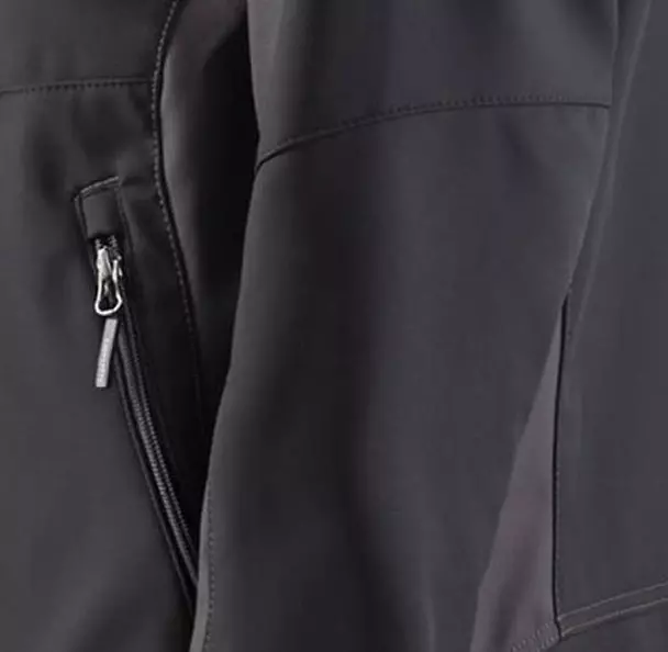 Designed for wearability, the jacket features **pre-shaped sleeves** for *optimal comfort and range of motion* and an **extended back** for enhanced coverage and protection against the wind and drafts when bending or stretching. The adjustable cuffs and hem further ensure a secure fit that seals out the elements.
