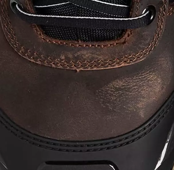 Crafted for tough outdoor environments, the uppers are made from **oiled leather** that provides a water-repellent barrier. The material is durable and long-lasting, while the **padded ankle section** provides stability and comfort, making these boots ideal for demanding work.