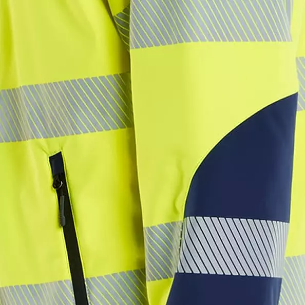 Ensure optimal visibility and safety with **50 mm wide transfer reflective strips** on the body and sleeves, meeting **EN ISO 20471 Class 3** standards (Class 2 for smaller sizes). The two-tone design incorporates **dark color panels** in areas prone to dirt exposure, maintaining a professional look while maximizing *safety in low-light conditions*.