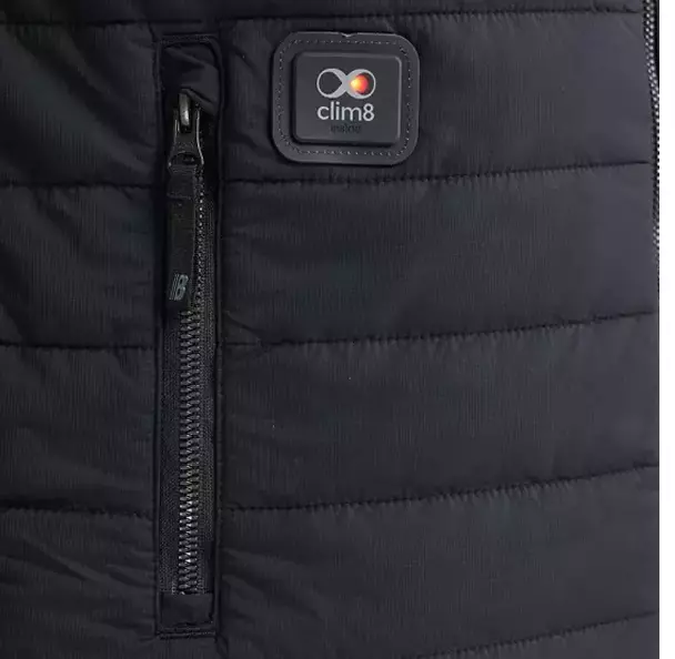 Equipped with **front zippered pockets**, this vest provides secure storage for your essentials. A dedicated pocket on the right side is designed to hold the included **rechargeable 7.4V 3000mAh Li-ion battery**, keeping it safely in place while powering the intelligent heating system.