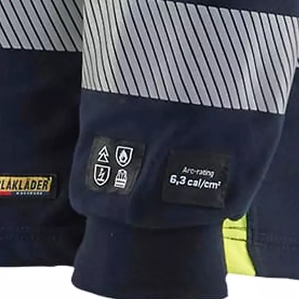 The long sleeves are finished with **elastic cuffs**, ensuring a snug and secure fit that keeps the sleeves in place. This design provides comfort and allows for a wide range of movement, preventing the sleeves from getting in the way while you work.