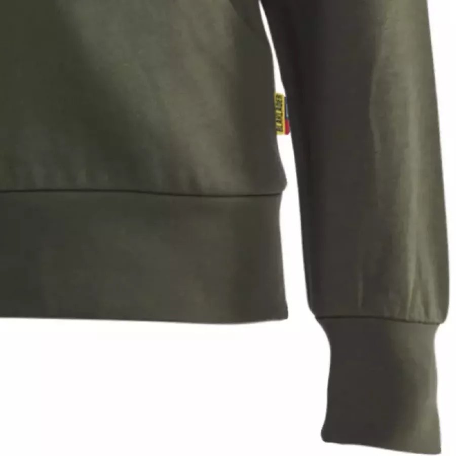 **Ribbed Cuffs** hold sleeves in place for comfort that moves with you.