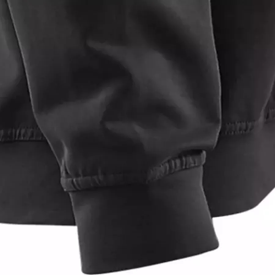 **Ribbed Cuffs** keep sleeves snug and warmth locked in without restricting comfort.