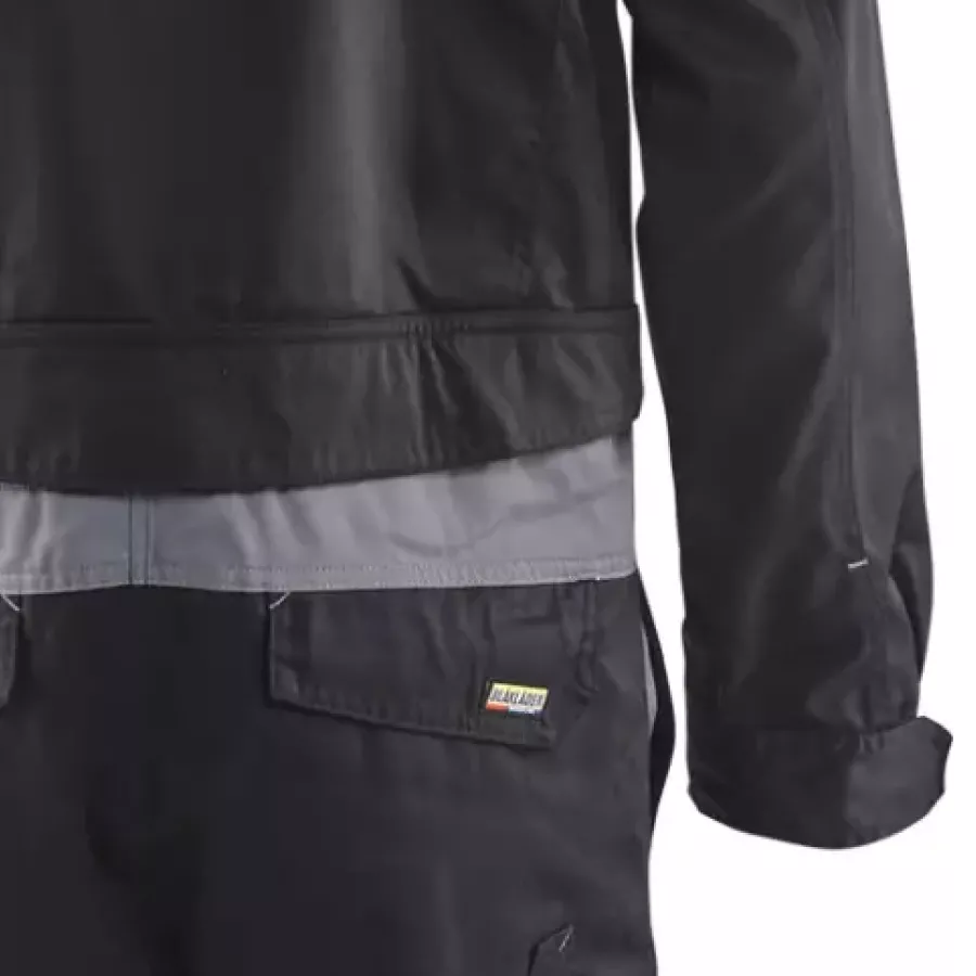 **Adjustable Cuffs and Elastic Waist** provide a comfortable, tailored fit that stays secure through any task.