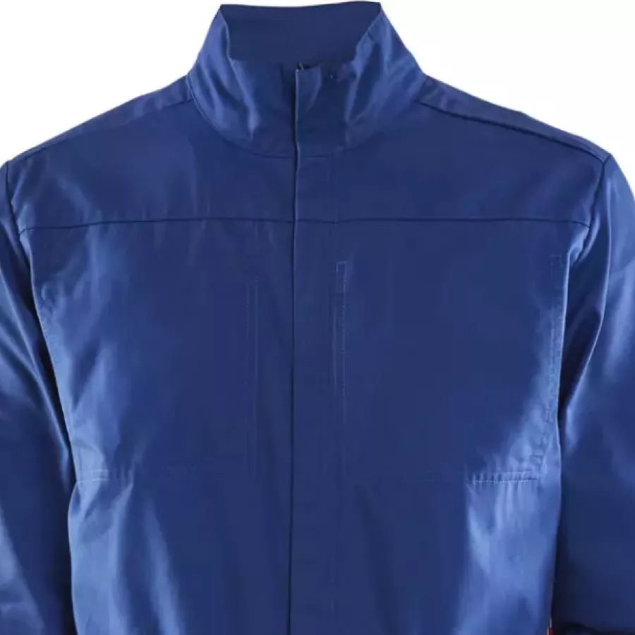 **Elastische Bündchen** halten die Ärmel eng anliegend und hygienisch, während sie Ihnen freies Arbeiten ermöglichen.