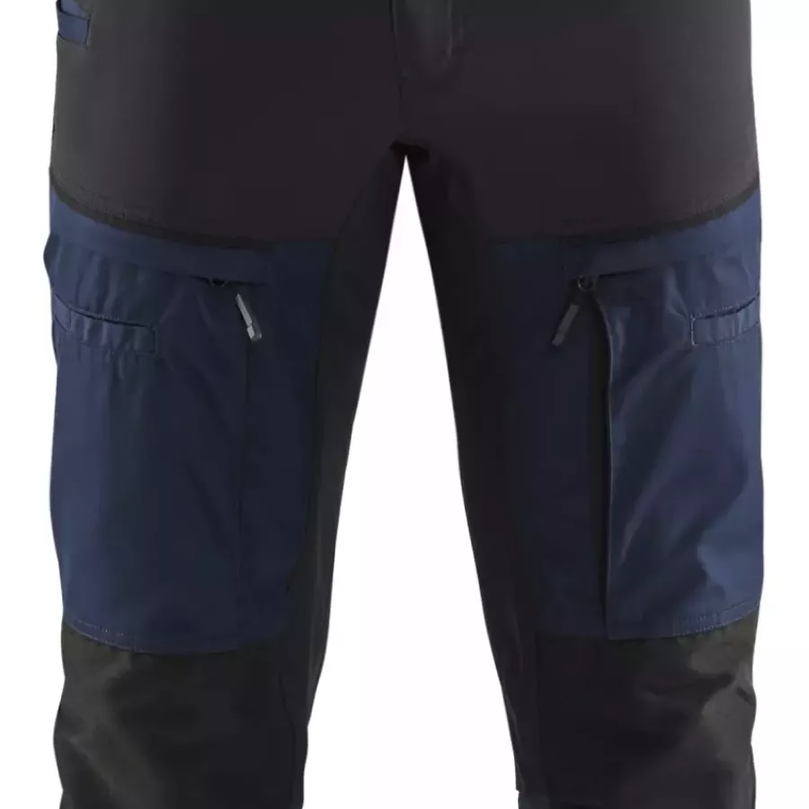 **Thigh Pocket with Zipper** keeps your tools and essentials safe and within easy reach.