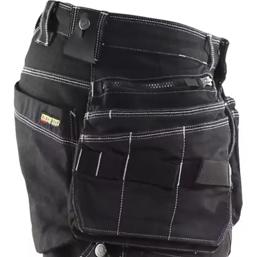 **Extra Wide Tool Pockets with Loops** keep your essentials organized and within easy reach all day.