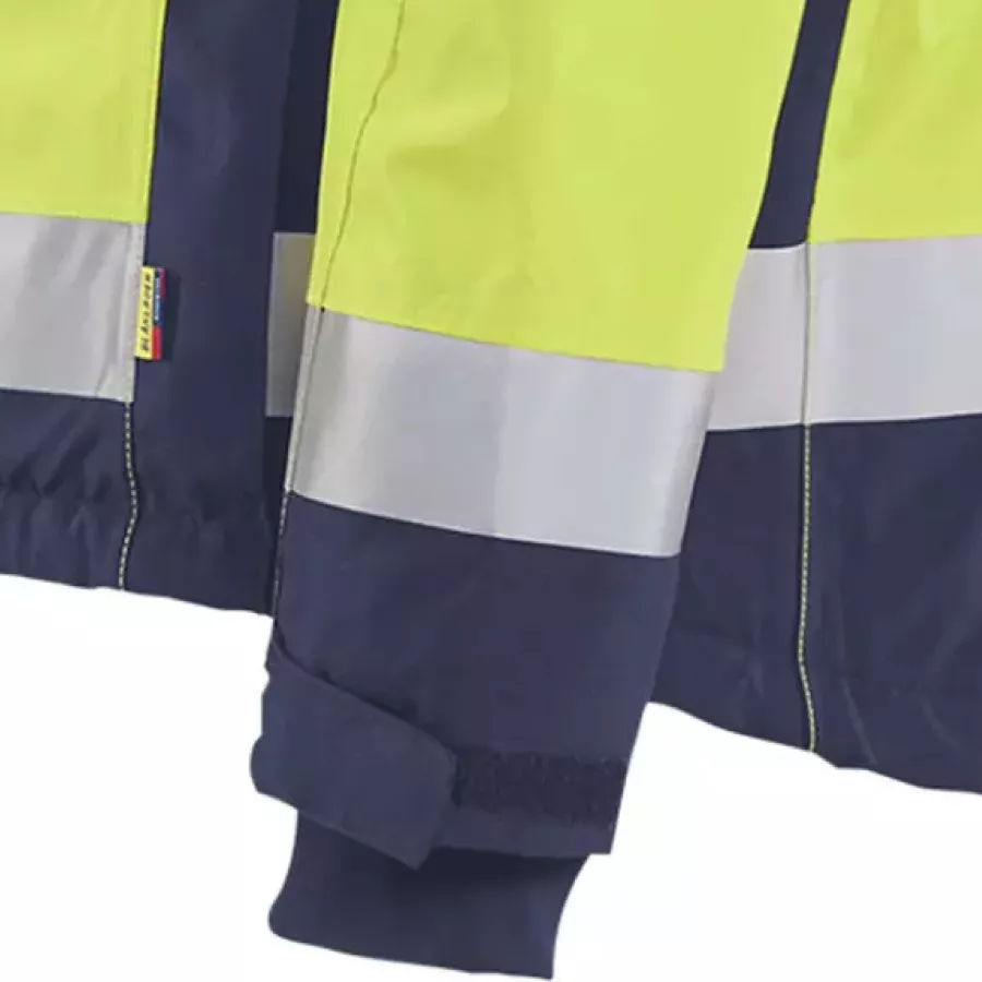 **Adjustable Velcro Cuffs** let you seal out cold and wind for a snug, personalized fit.