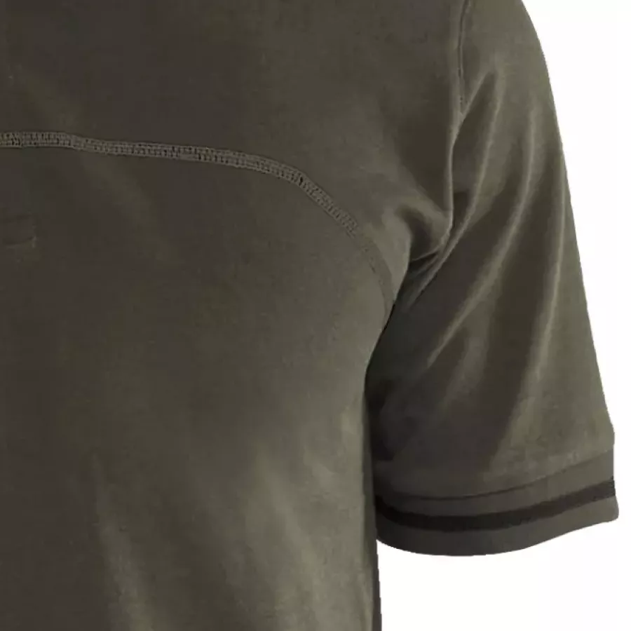 **Short Sleeves with Ribbed Cuffs** offer easy movement while maintaining a neat, structured finish.