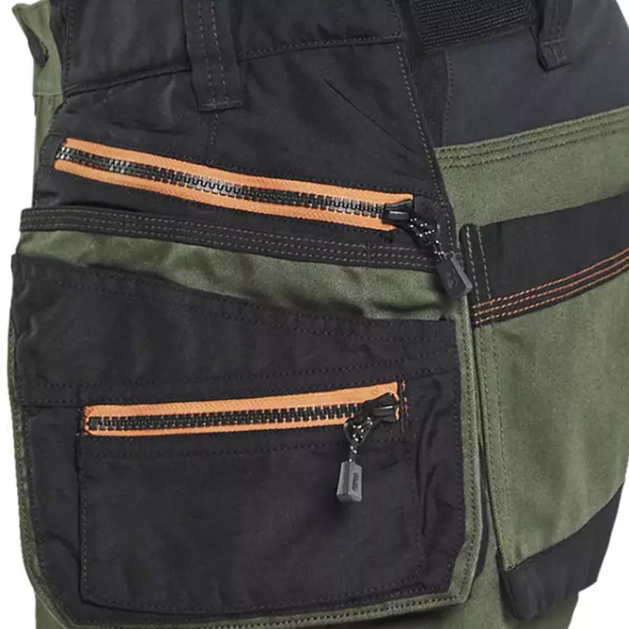 **Removable Tool Pockets** offer customizable storage based on your work needs.