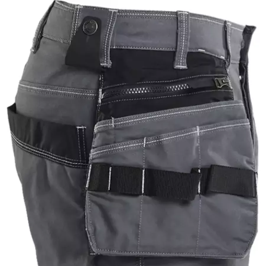 **Extra Wide Tool Pockets with Loops** keep your essentials organized and within easy reach all day.