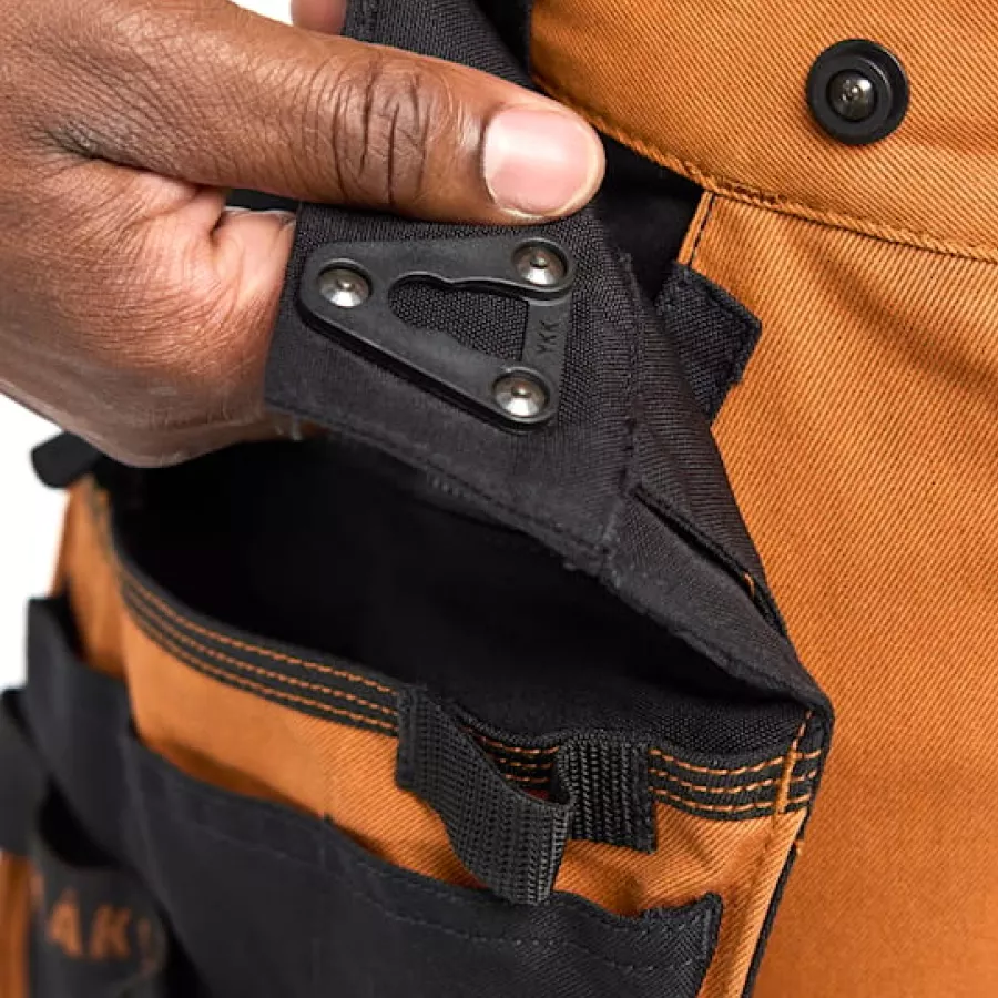 **Detachable Tool Pockets** offer quick, customizable storage so you can carry only what you need.