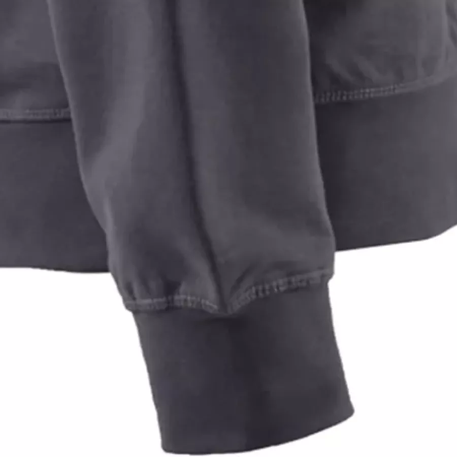 **Ribbed Cuffs** hold the sleeves in place while keeping warmth comfortably close.