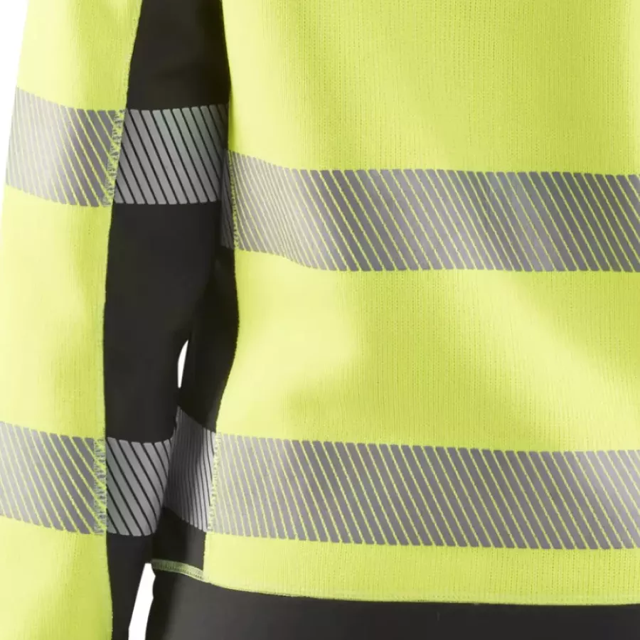 **Segmented Reflective Strips** enhance visibility while staying flexible and comfortable as you move.