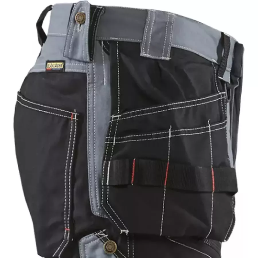 **Reinforced Tool Pockets** keep your essential gear secure and within easy reach all day long.