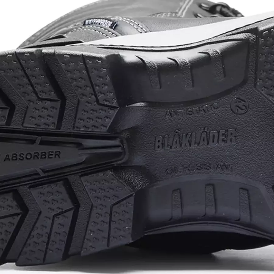 **Anti-Slip Outsole** provides steady grip on icy or wet surfaces for confident footing.