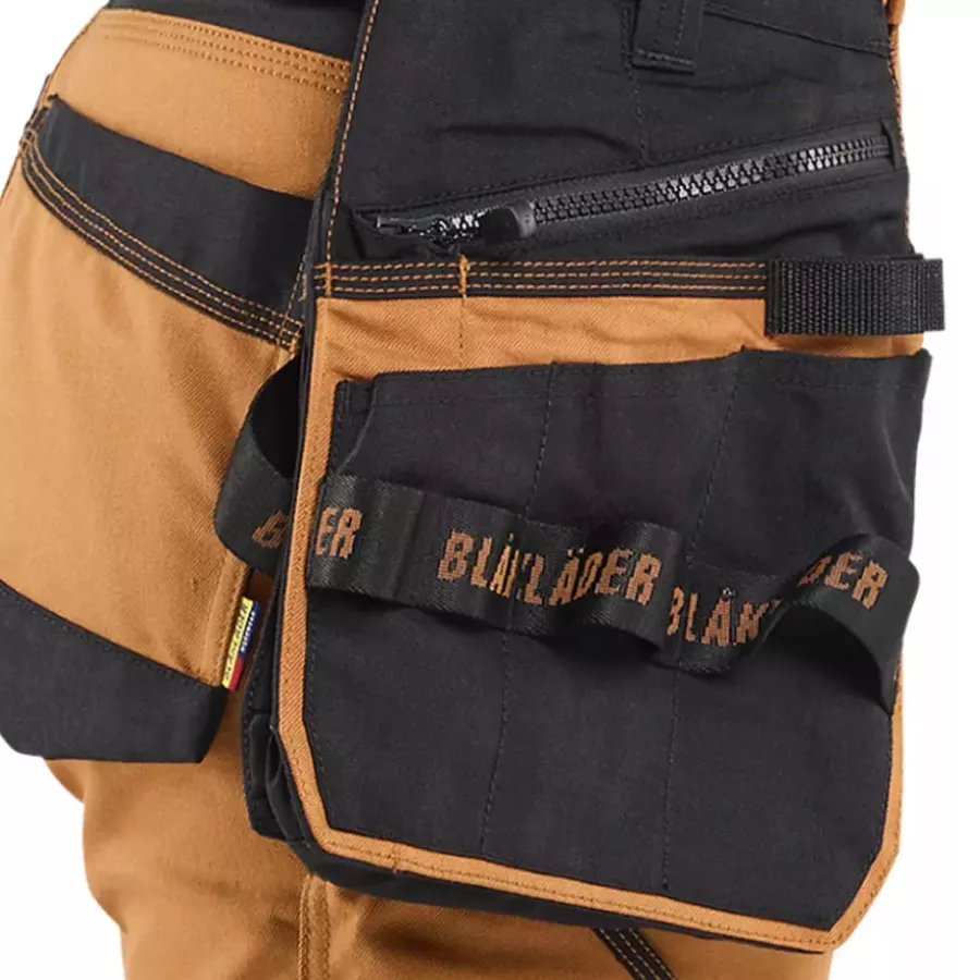 **Detachable Holster Pocket** lets you keep essential tools within reach and lighten your load whenever you want.