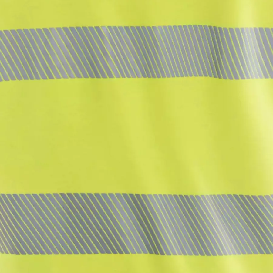 **Segmentierte Reflexstreifen** verbessern die Sichtbarkeit, während sie flexibel bleiben und geschmeidige, uneingeschränkte Bewegung ermöglichen.