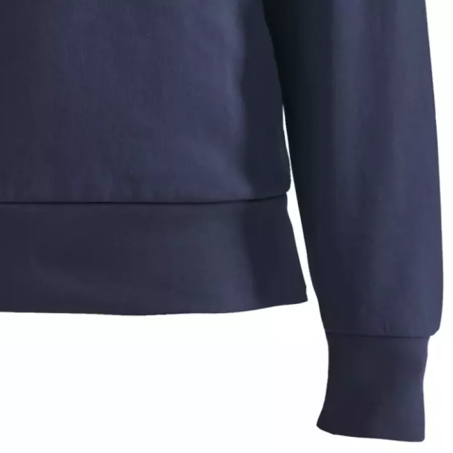 **Ribbed Cuffs** hold sleeves in place for comfort that moves with you.