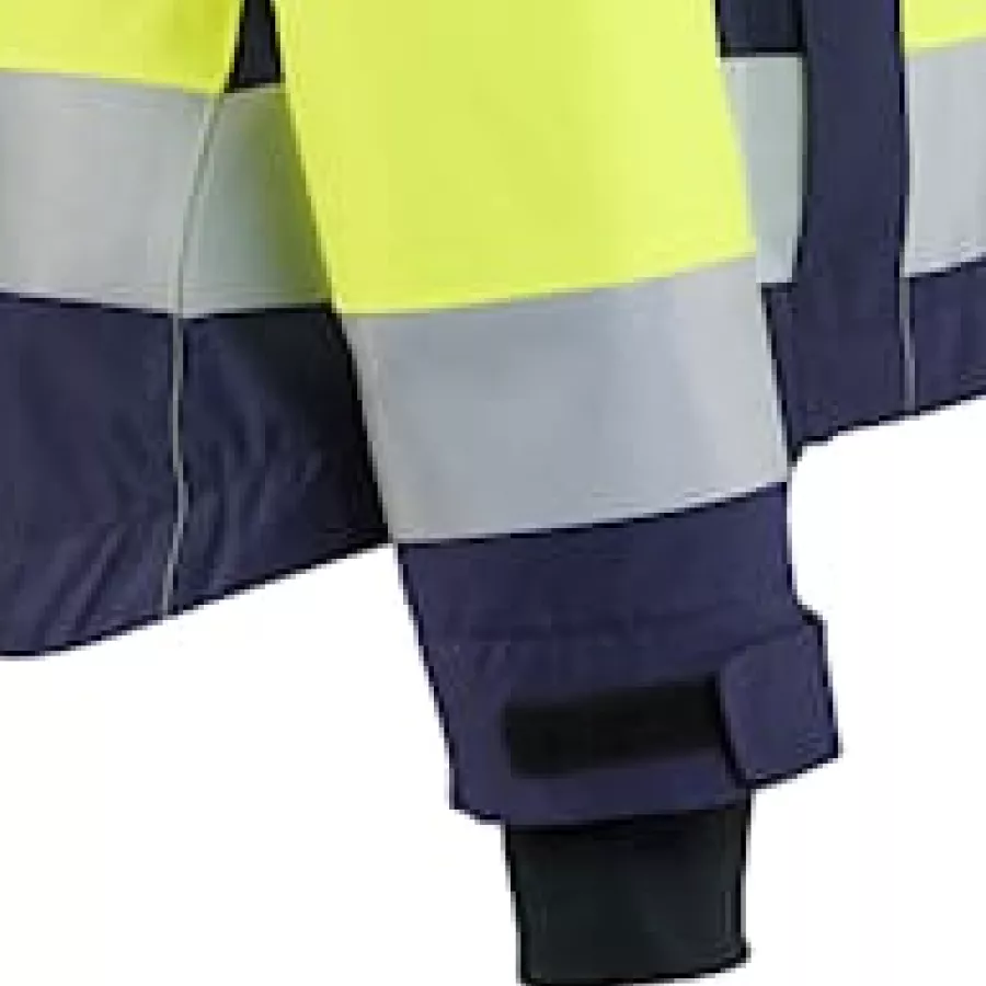 **Adjustable Velcro Cuffs with Thumb Hole** ensure a secure fit while keeping sleeves in place and offering added hand protection.