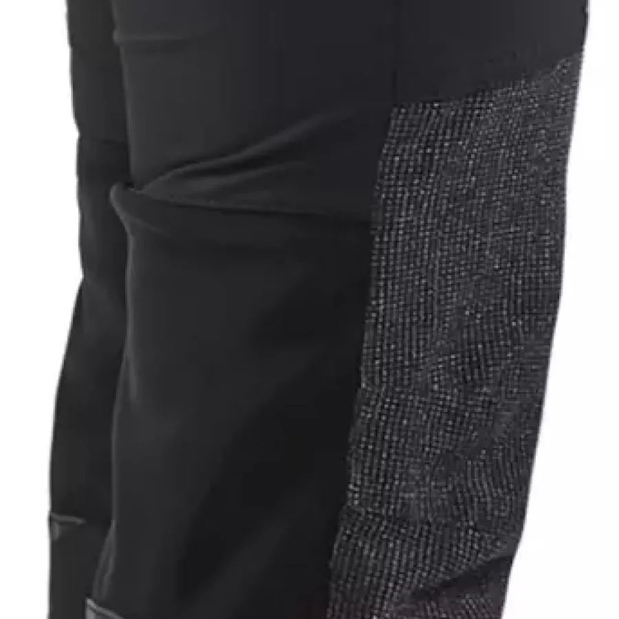 **Mesh-Einsatz in der Kniekehle** verbessert die Atmungsaktivität und hält Sie bei aktiver Arbeit kühl.