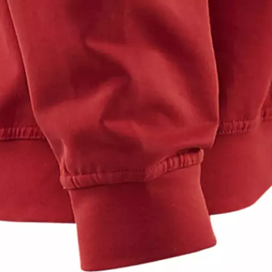 **Ribbed Cuffs** keep sleeves snug and warmth locked in without restricting comfort.